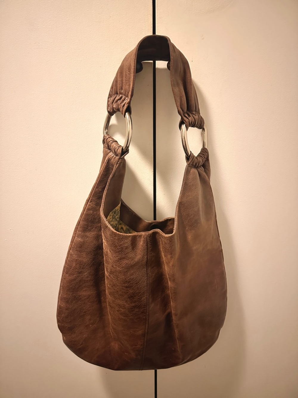Brown Leather Hobo International Bag with Silver Ring Accents
